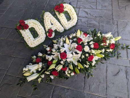 red & white casket spray with DAD